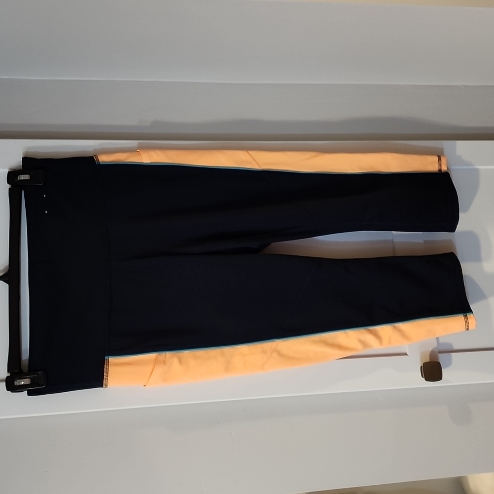 Xersion, Capri Leggings. Navy/orange/teal. L